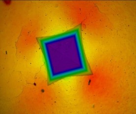 Hot hardness test indentation measured at 650 °C, showing material deformation and hardness response under elevated temperature conditions.
