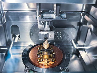 Ultra-low-temperature liquid helium tribometer inside setup for friction, wear, hardness, scratch resistance measurements under vacuum at cryogenic temperatures.